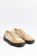 Tenis unicolores casuales con suelas planas en contraste