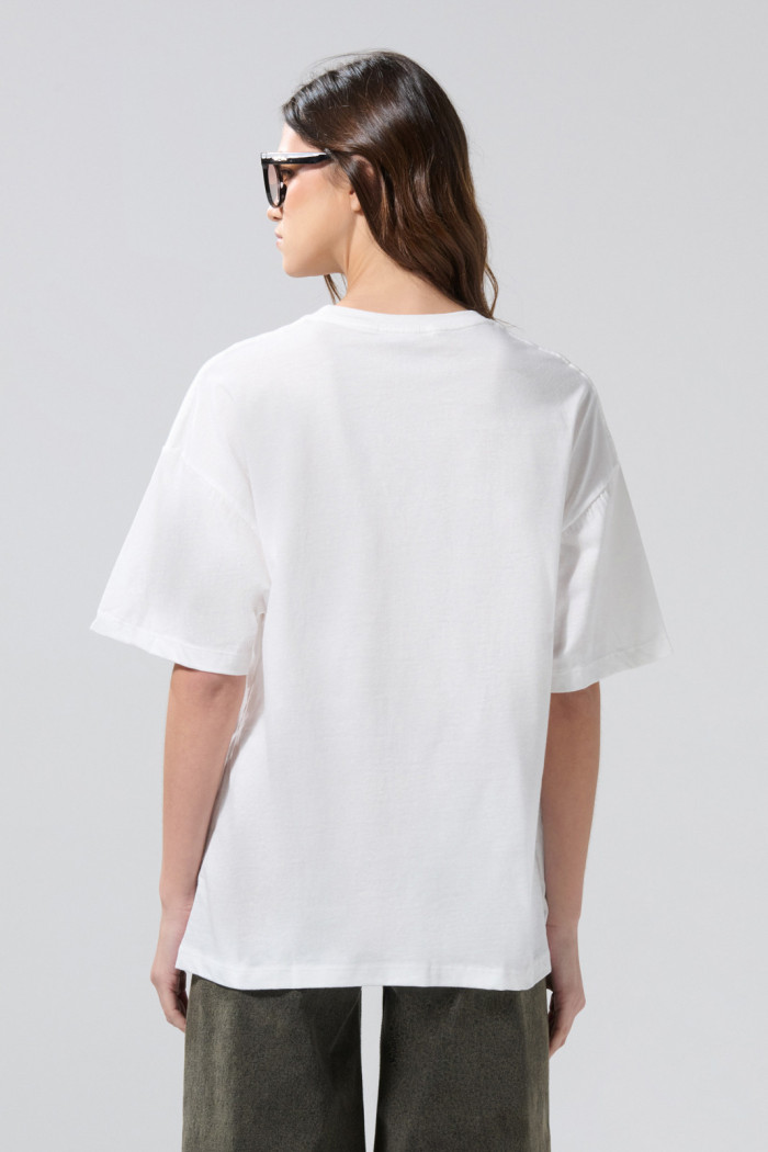 Camiseta oversize de Snoopy crema con manga corta