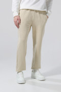 Pantalón unicolor jogger con bolsillos y elásticos