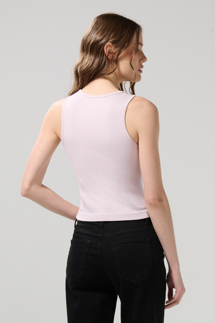 Camiseta crop top acanalada unicolor con manga sisa