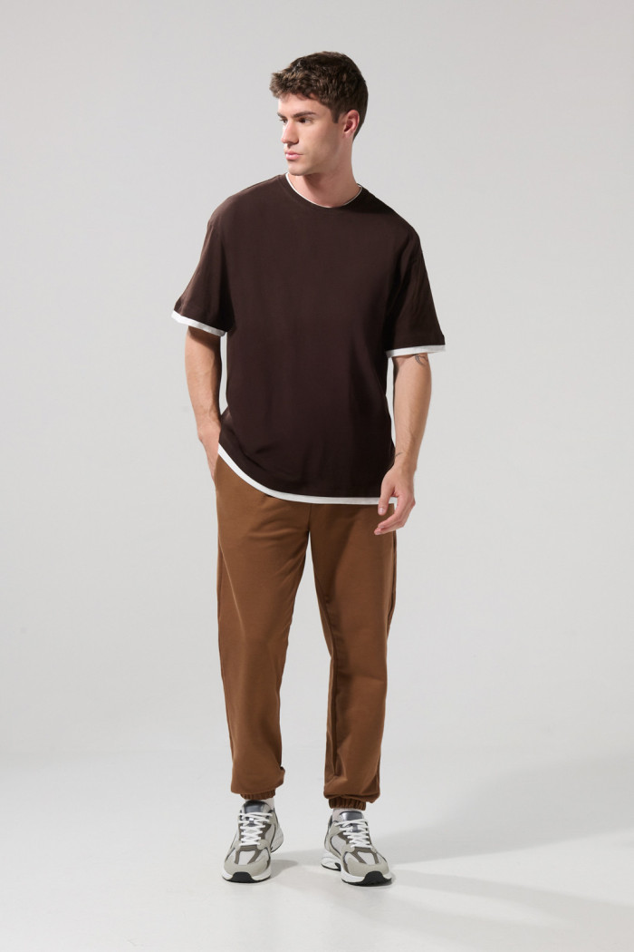Camiseta oversize cuello redondo unicolor con contrastes