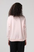 Buzo oversize cuello redondo rosado con arte de My Melody