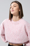 Buzo cuello redondo rosado oversize con diseño animal print