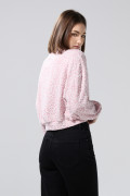 Buzo cuello redondo rosado oversize con diseño animal print