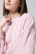 Buzo cuello redondo rosado oversize con diseño animal print