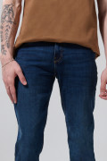 Jean azul oscuro skinny con tiro bajo y 5 bolsillos