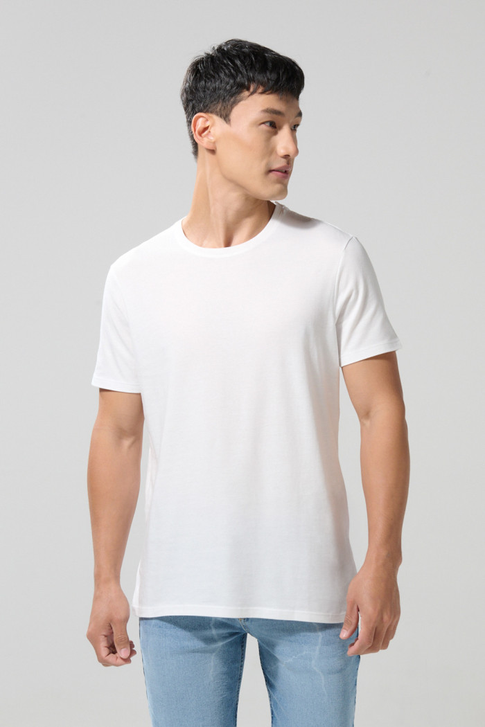 Camiseta unicolor cuello redondo ajustada en algodón