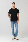 Camiseta unicolor cuello redondo ajustada en algodón