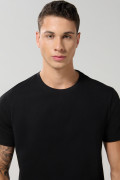 Camiseta unicolor cuello redondo ajustada en algodón