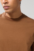 Camiseta unicolor en algodón manga corta con hombro rodado