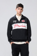 Buzo college oversize negro cuello alto con cremallera