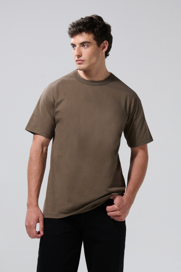 Camiseta unicolor manga corta en algodón con hombro rodado