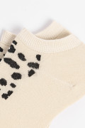 Medias unicolores tobilleras con arte de animal print