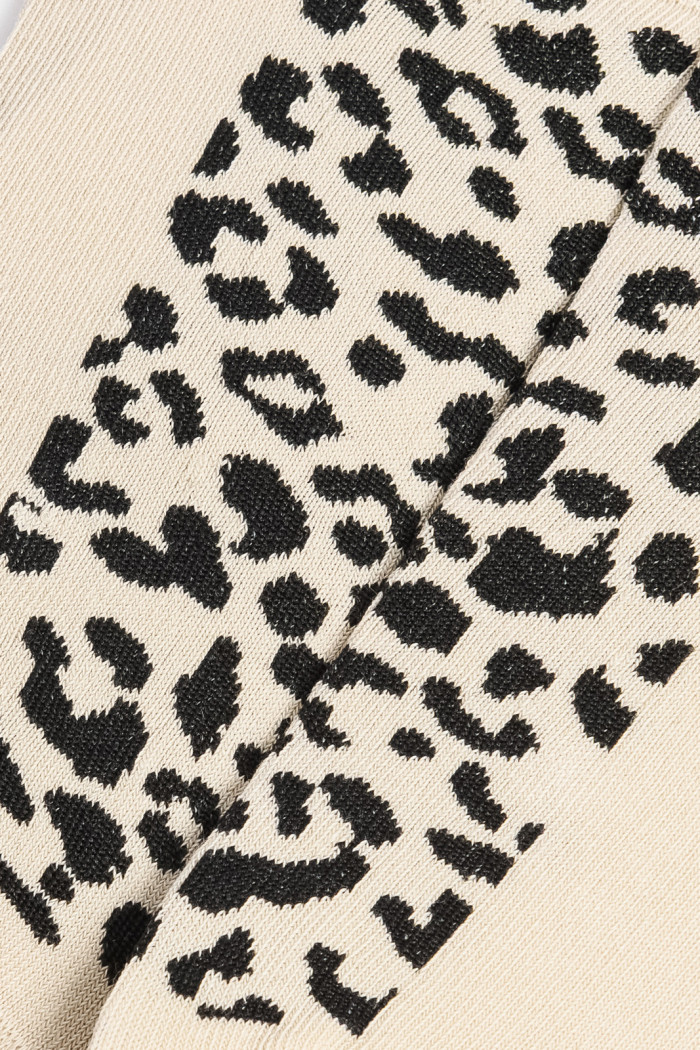 Medias unicolores tobilleras con arte de animal print
