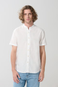 Camisa en algodón unicolor cuello nerú con botones