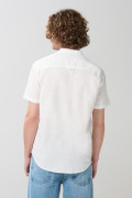 Camisa en algodón unicolor cuello nerú con botones