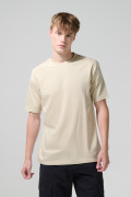 Camiseta manga corta en algodón unicolor con hombro rodado