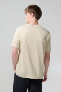 Camiseta manga corta en algodón unicolor con hombro rodado