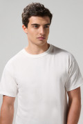 Camiseta manga corta unicolor con hombro rodado en algodón