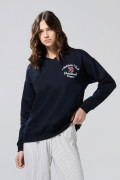 Buzo cuello V oversize azul con diseños college