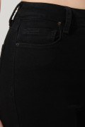 Jean jegging negro ceñido con cremallera y tiro alto