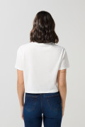 Camiseta crema clara crop top con diseño de Moana