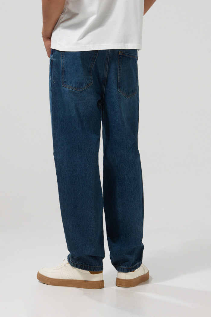 Jean azul oscuro baggy con bota ancha y cremallera