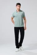 Camiseta polo unicolor con texturas y cuello V