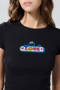 Camiseta negra manga corta acanalada de Plaza Sésamo