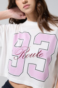 Camiseta oversize crop top crema clara con arte college