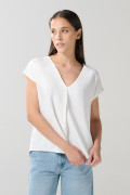 Blusa unicolor manga sisa con escote V y prense delantero