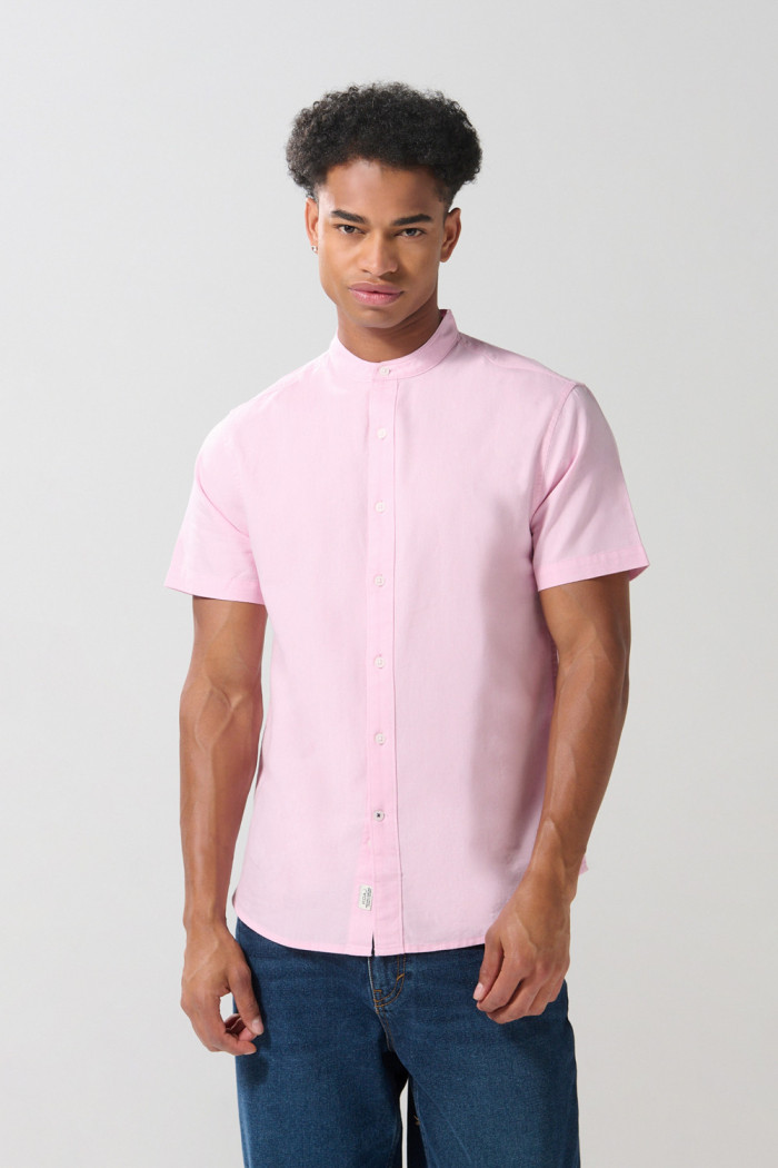 Camisa cuello nerú en algodón unicolor con manga corta