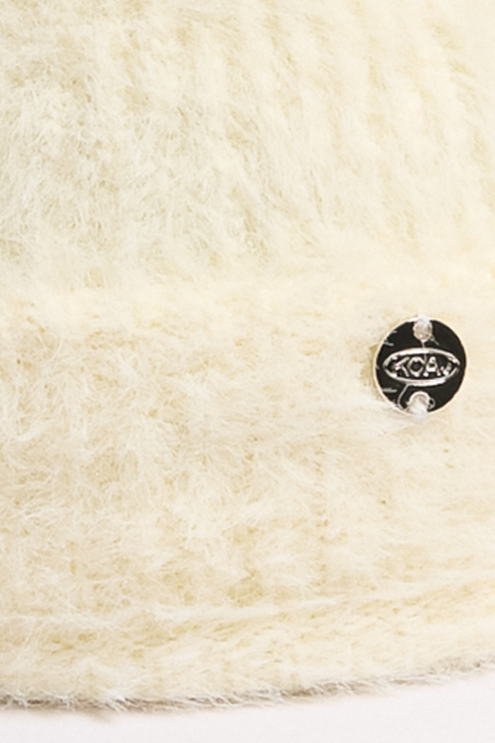 Gorro tejido unicolor con doblez ajustable y texturas