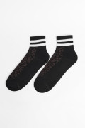 Medias unicolores cortas con rayas y diseños de animal print