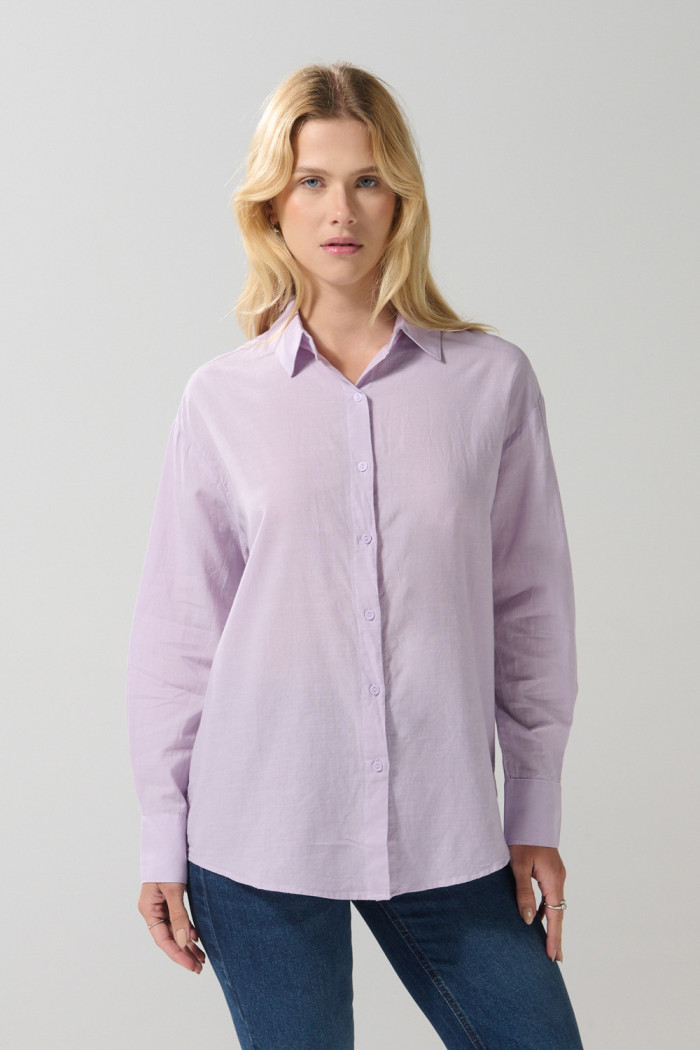 Blusa unicolor oversize manga larga en algodón