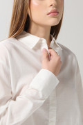 Blusa unicolor oversize manga larga en algodón
