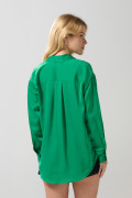 Blusa manga larga unicolor en satín con botones