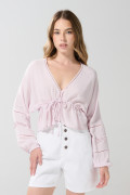 Blusa crop top unicolor con escote V y manga larga