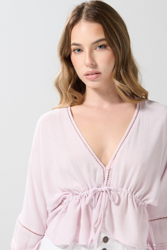 Blusa crop top unicolor con escote V y manga larga