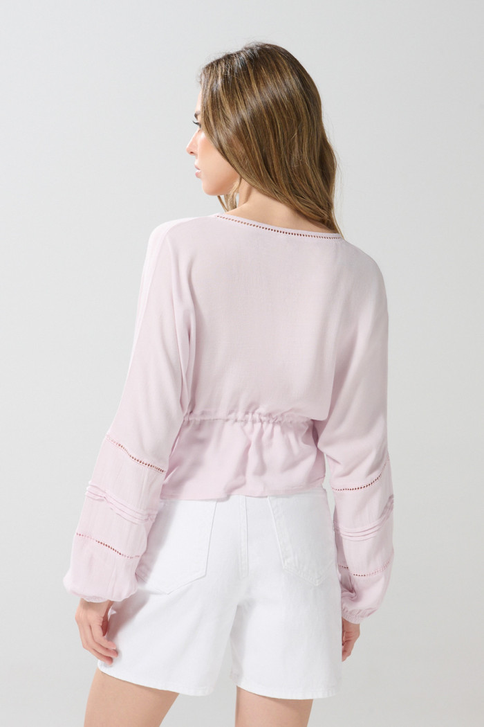 Blusa crop top unicolor con escote V y manga larga