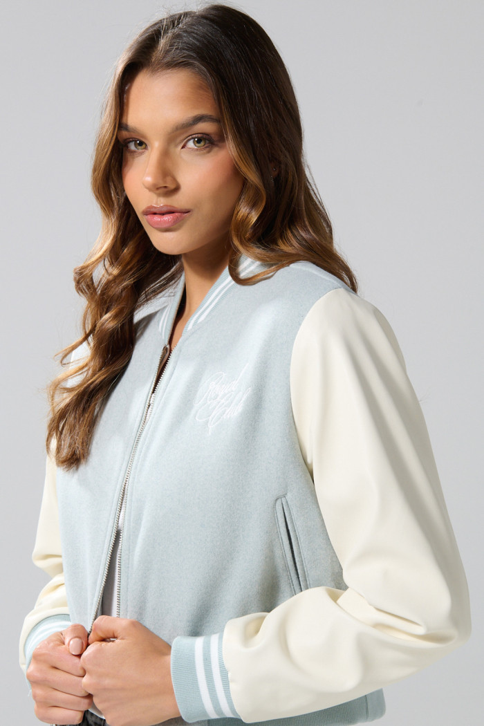 Chaqueta bomber verde college con mangas en contraste