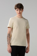 Camiseta cuello redondo unicolor con doblez en puños