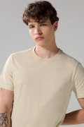 Camiseta cuello redondo unicolor con doblez en puños