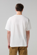 Camiseta oversize crema clara manga corta con texto en frente