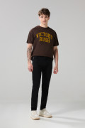 Jean skinny ajustado negro con tiro bajo y cremallera
