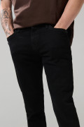 Jean skinny ajustado negro con tiro bajo y cremallera