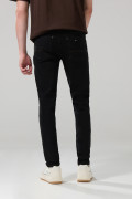Jean skinny ajustado negro con tiro bajo y cremallera