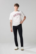 Jean azul intenso skinny con tiro bajo y 5 bolsillos