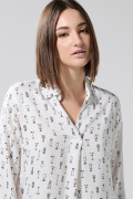 Blusa unicolor estampada con manga larga y charretera