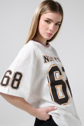 Camiseta crema clara oversize college con manga corta